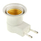 White E27 lamp socket adapter with gold screw base visible inside the socket