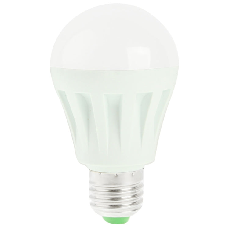 White LED bulb front view with diffuser top and metal screw base