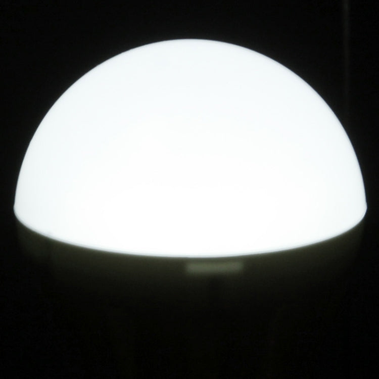 Illuminated white LED bulb glowing bright dome light