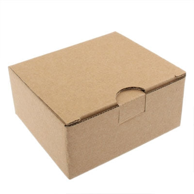 Brown cardboard shipping box with a side seam and folding lid