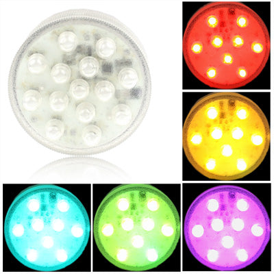 Round multi-color LED light with clear cover, showing white light bulbs