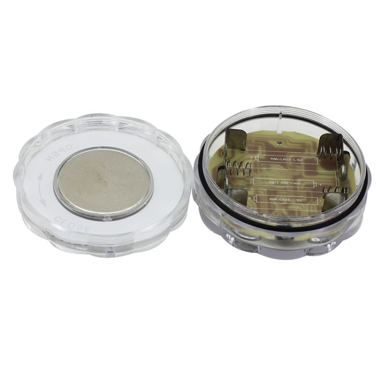 Round 10-LED light with clear housing, shown from top and open underside with contacts
