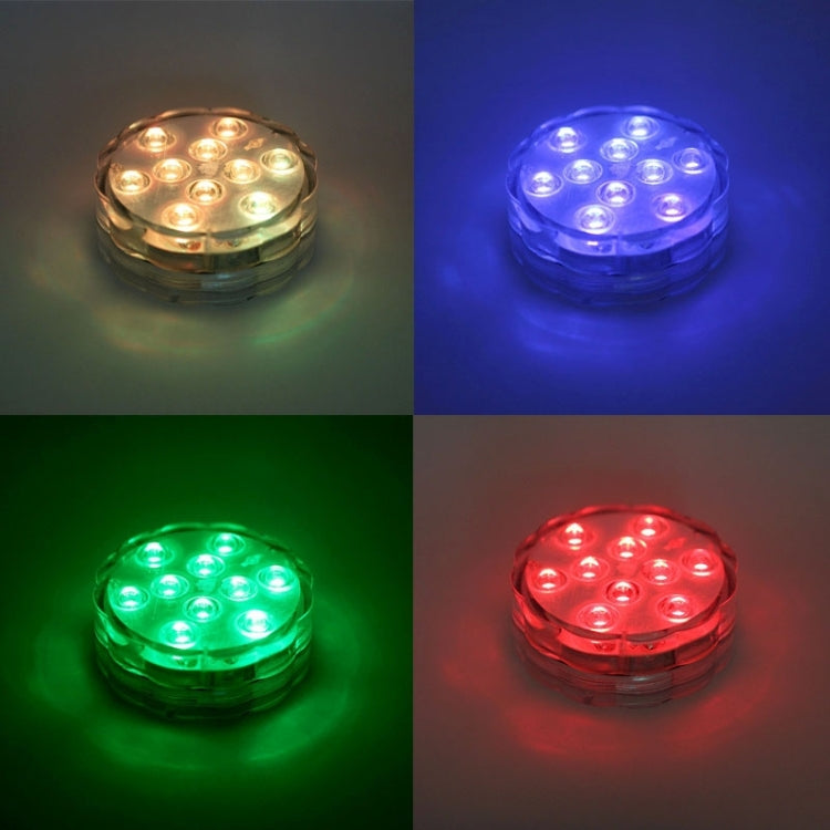 Round 10-LED light displaying multi-color illumination in red, green, blue, and purple