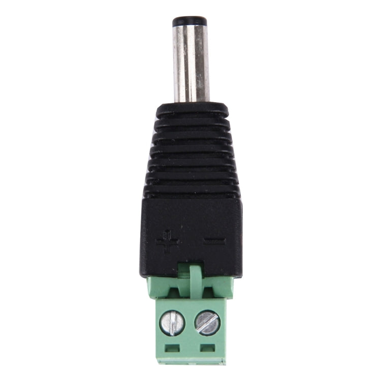 DC power male plug with black housing, silver center pin, green 2-pin terminal
