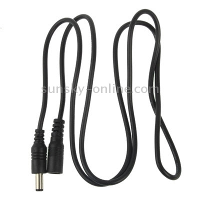 Black DC power connector cable with barrel plug at one end and matching plug at other