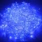 Blue glowing LED string lights with tangled cable