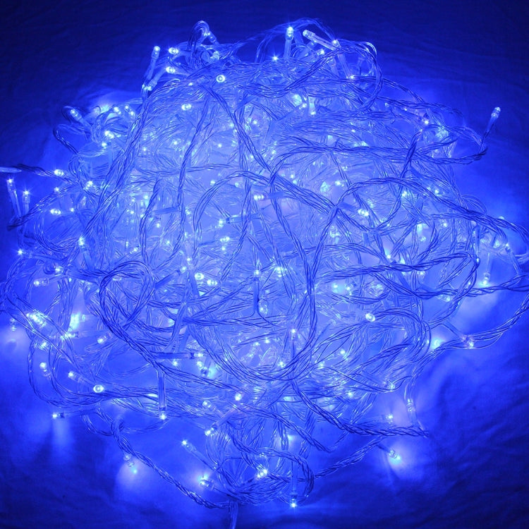 Blue glowing LED string lights with tangled cable