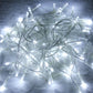 50-LED battery string lights spread across a surface, white glowing bulbs
