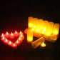 Warm LED candle lights on a charging base with several candles glowing