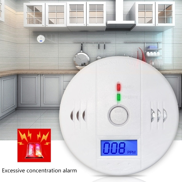 White round carbon monoxide detector with LCD readout and alarm indicator LEDs