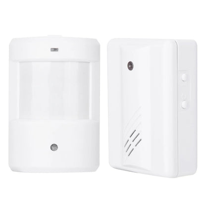White wireless doorbell and wall sensor unit with speaker grille and small indicator