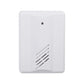 White wireless doorbell receiver with speaker grille and small status lens