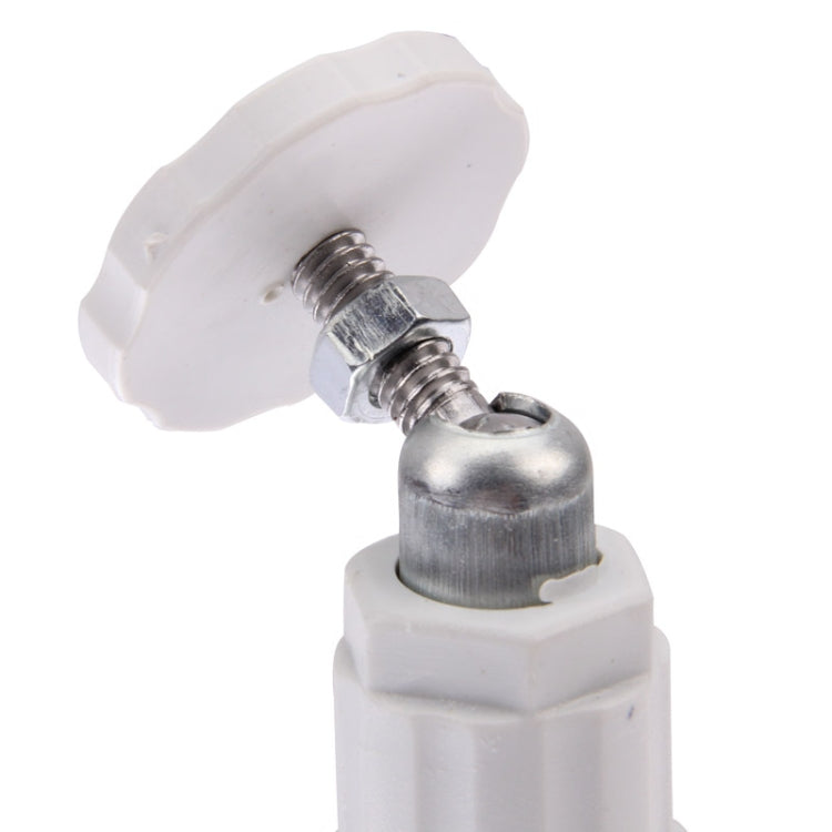 Close-up of white wall mount bracket hinge with metal spring and joint