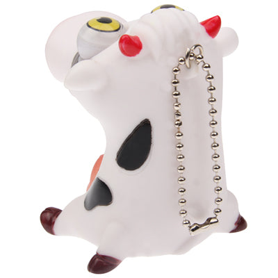 White pig eye toy figure with keychain chain and yellow-ring eyes
