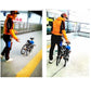 Bicycle with blue auxiliary wheel boosters for stability during walking