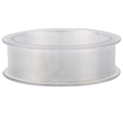 White fishing line spool with neatly wound coiled line