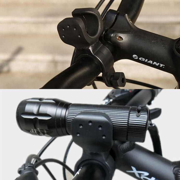 GIANT bike handlebar with black flashlight mount and wired light