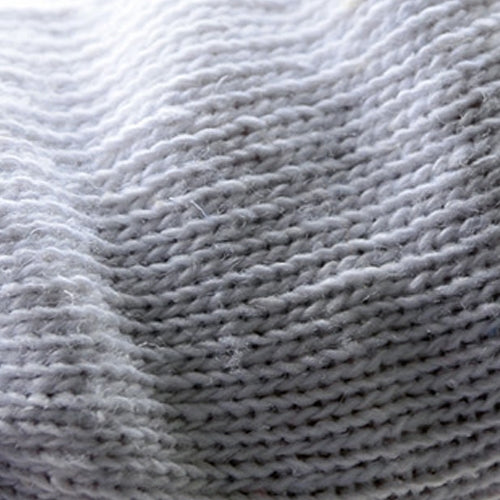 White cotton glove knit texture close-up with dense ribbed weave