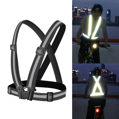 Black reflective safety vest with crossed straps and adjustable front buckles