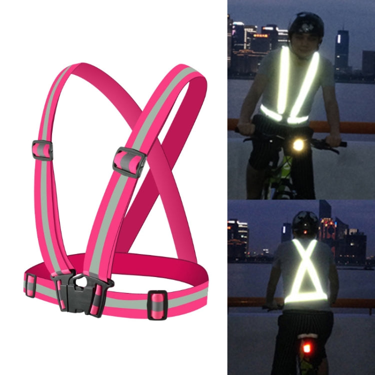 Magenta reflective safety vest with crossed straps and adjustable front buckles