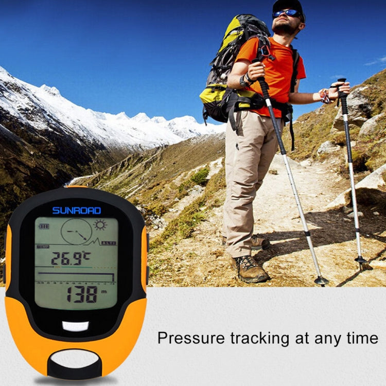 Orange and black handheld LCD digital altimeter with compass, visible screen