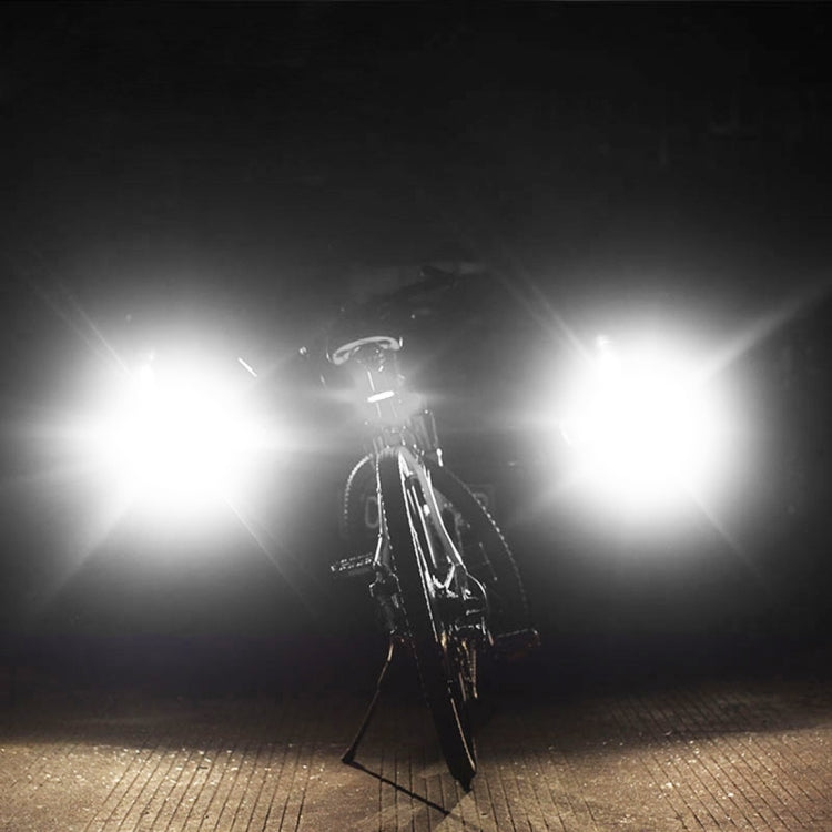Glowing USB rechargeable bicycle LED taillight mounted on a bicycle rear