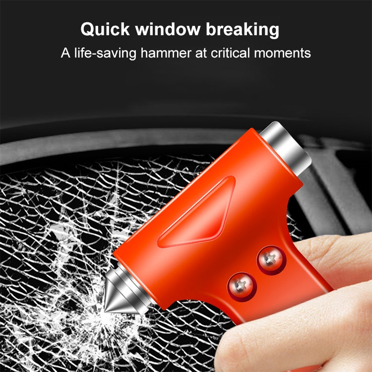 Orange emergency escape hammer with pointed head beside cracked window glass