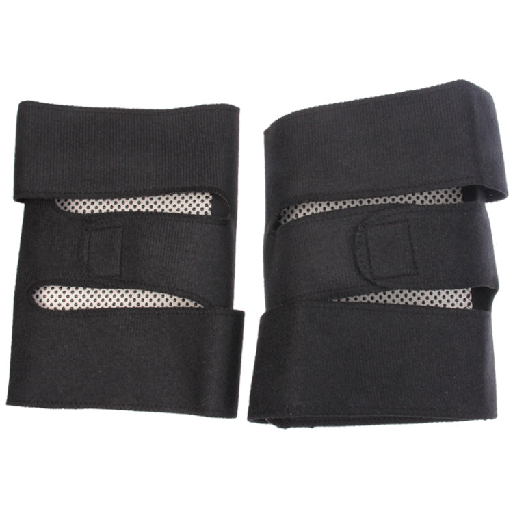 Black infrared kneepad pair showing dotted heat panels and hook-and-loop closure