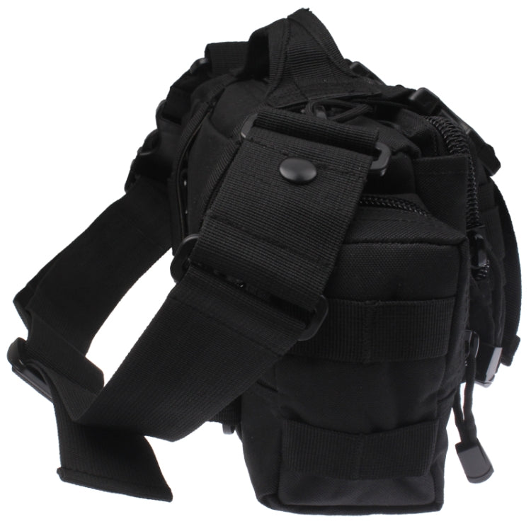 Black tactical waist bag side view with wide webbing strap, front pouch, and buckle tabs