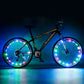 Bicycle with multicolor LED wheel lights, glowing spokes on front and rear wheels