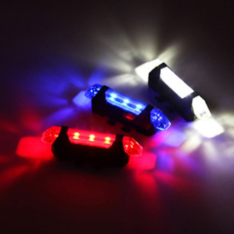 Bike LED taillight displaying red and blue lighting modes.