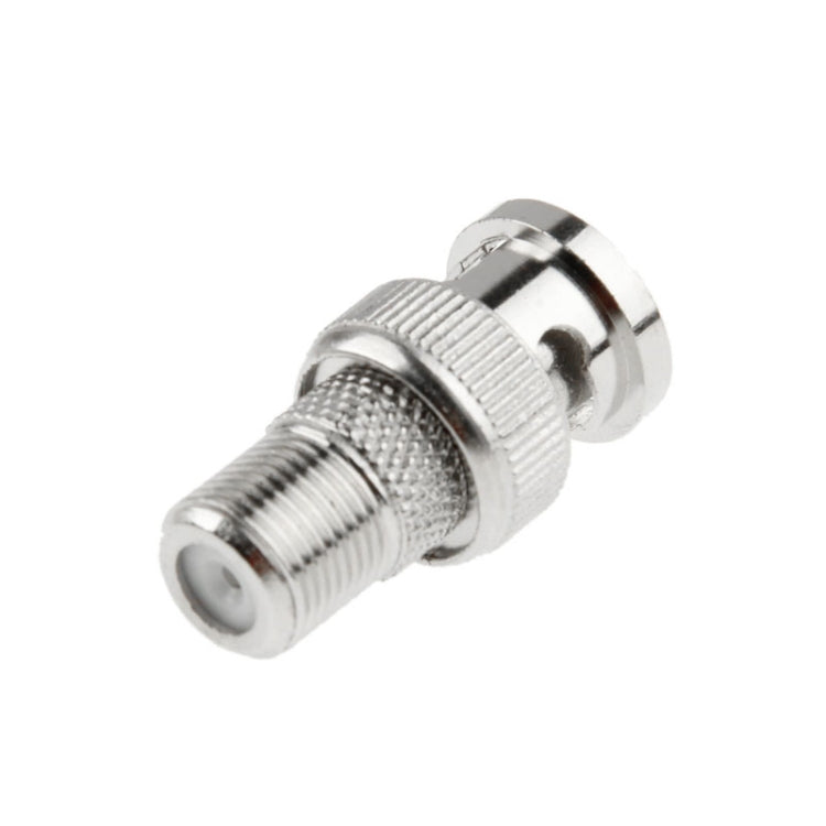 Silver BNC male plug to F jack connector, view of threaded barrel and inner pin
