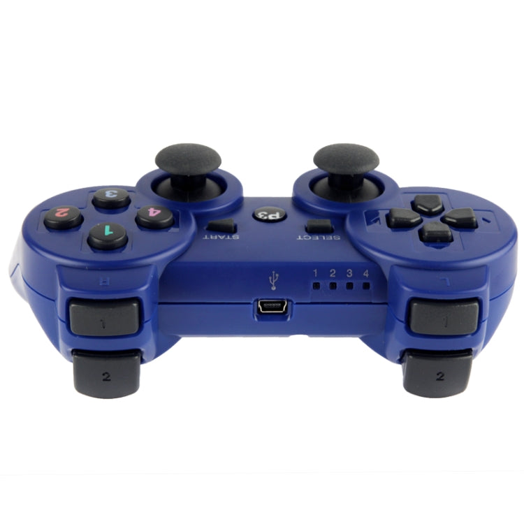 Blue wireless PS3 controller underside with USB port and SD card slot area