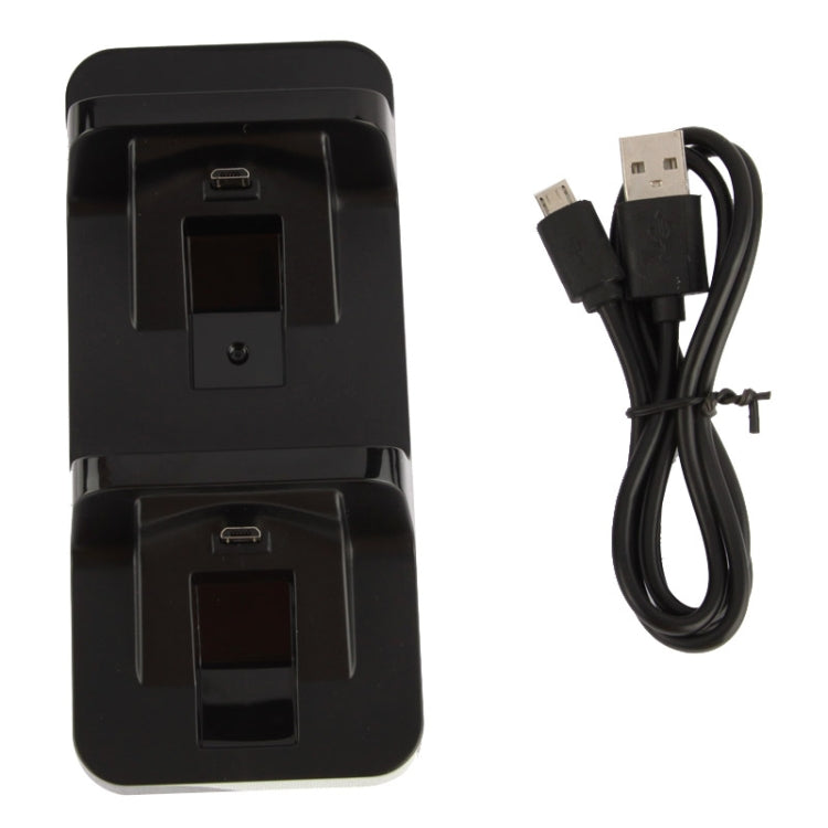Back view of black dual charging dock with USB cable attached