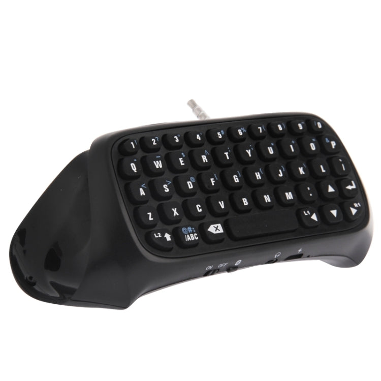 Black wireless mini keyboard with raised QWERTY keys and navigation controls