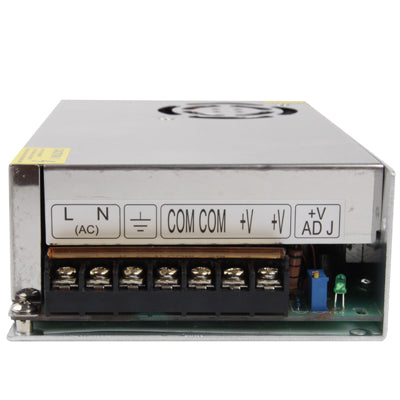 DC power supply front with terminal blocks and voltage adjustment controls