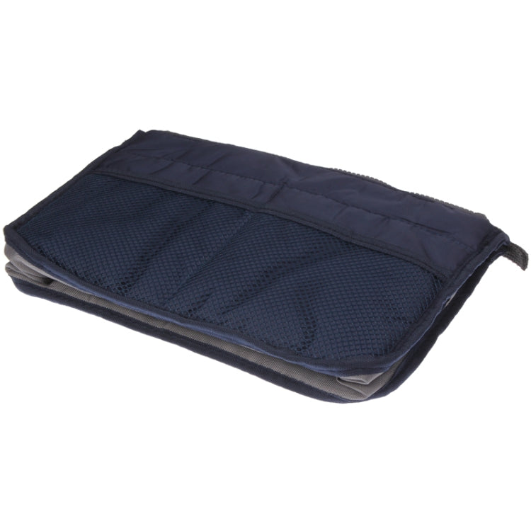 Dark navy double-zip cosmetic bag, folded flat view with textured mesh front.