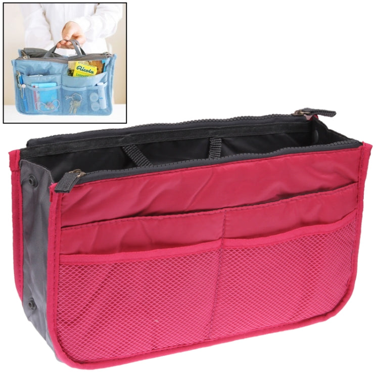 Magenta double-zip cosmetic bag with front mesh panel and carry handle.