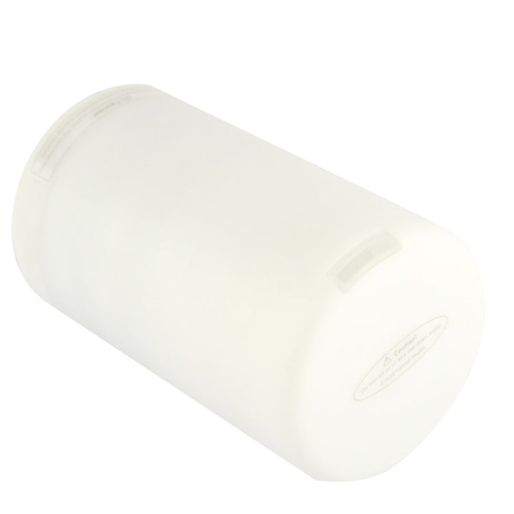 White aroma diffuser cylinder with side label and smooth rounded housing