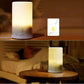 White aroma diffuser humidifier with warm LED light glowing from the base