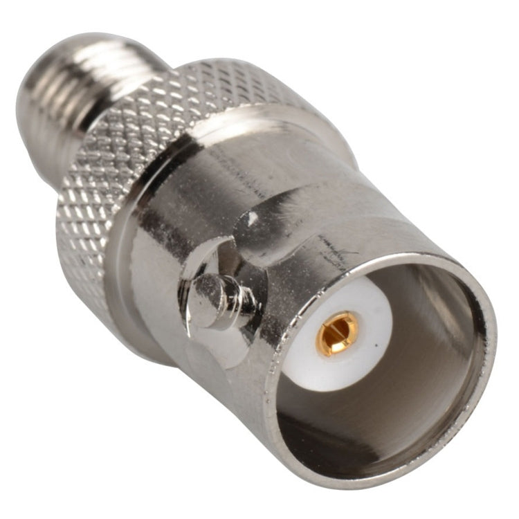 SMA end of BNC-to-SMA jack adapter with threaded coupling ring and gold center