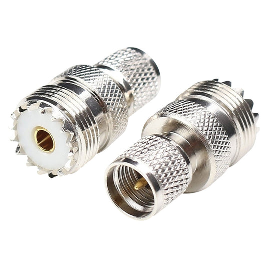 UHF RF adapter connector, silver textured grip, visible gold center contacts