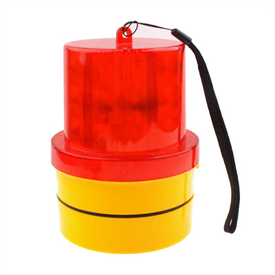 Red strobe warning light with yellow base and black cable extending from top