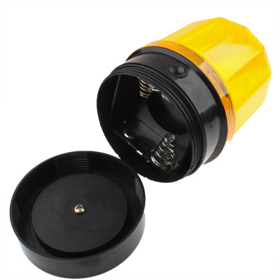 Yellow 6-LED strobe warning light with magnetic base, open spring contacts visible