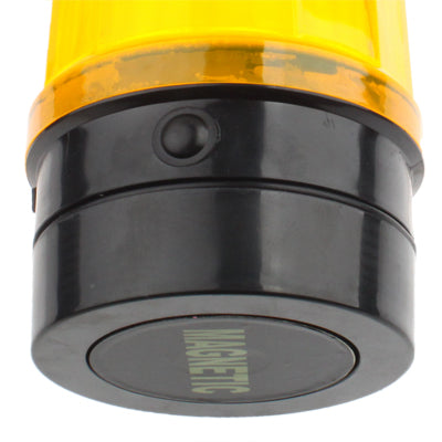 Yellow 6-LED strobe warning light close-up of black base with warning markings