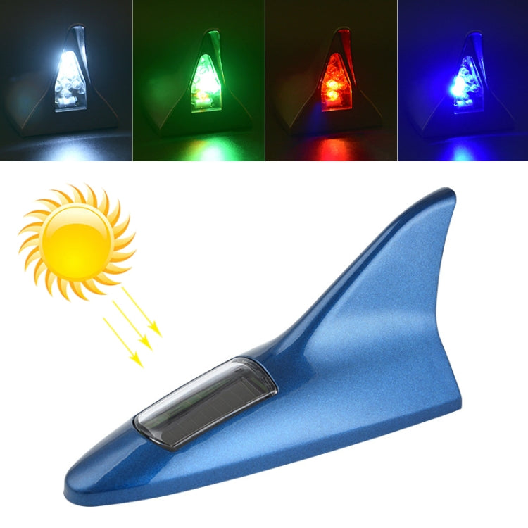 Solar shark fin alarm light with blue body and clear LED lens on top