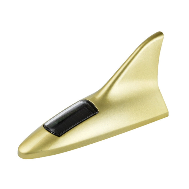 Gold solar shark fin high-mounted alarm light with black solar panel strip