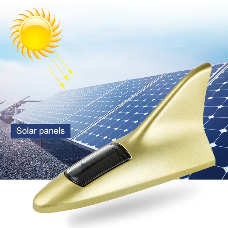 Gold solar shark fin alarm light with solar panel and sun-ray indicator