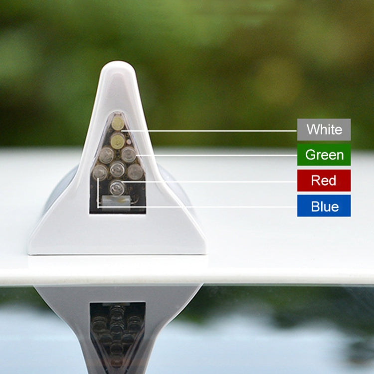 Triangular solar alarm light interior with multiple LED lenses and color labels