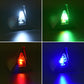 Solar shark fin alarm light glowing in blue, green, red, and white LED colors